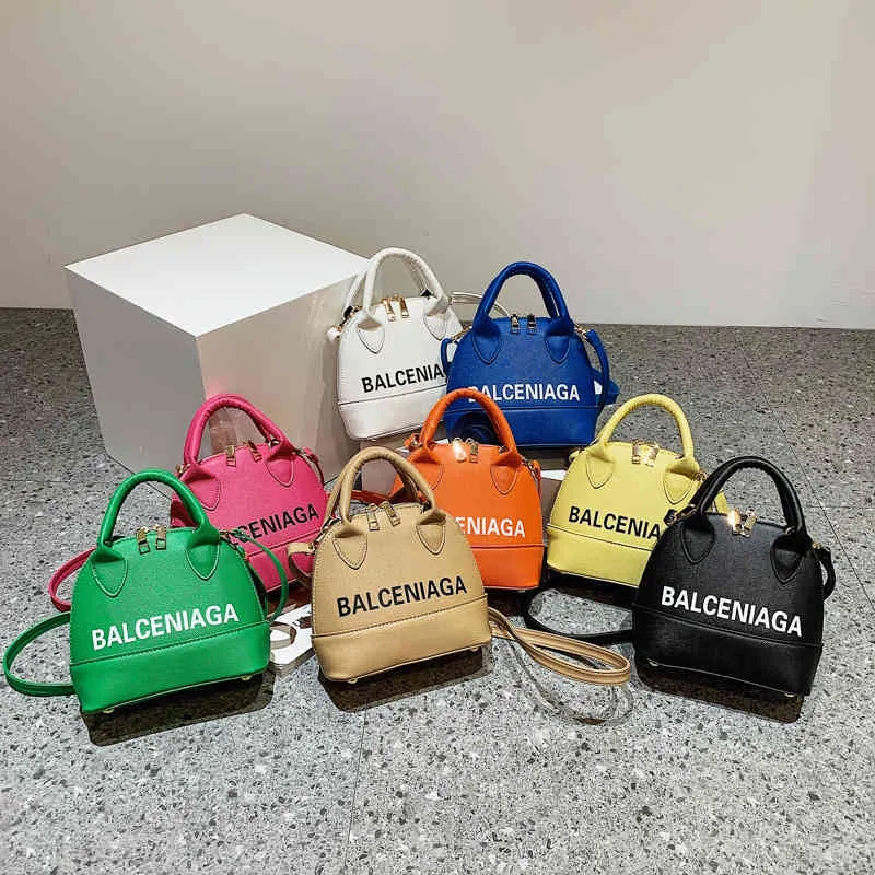 62% DE DESCUENTO 2022 bolsos de moda Bolso de concha para mujer nuevo mensajero portátil de un hombro moda pop fábrica carga carta de gran capacidad color caramelo