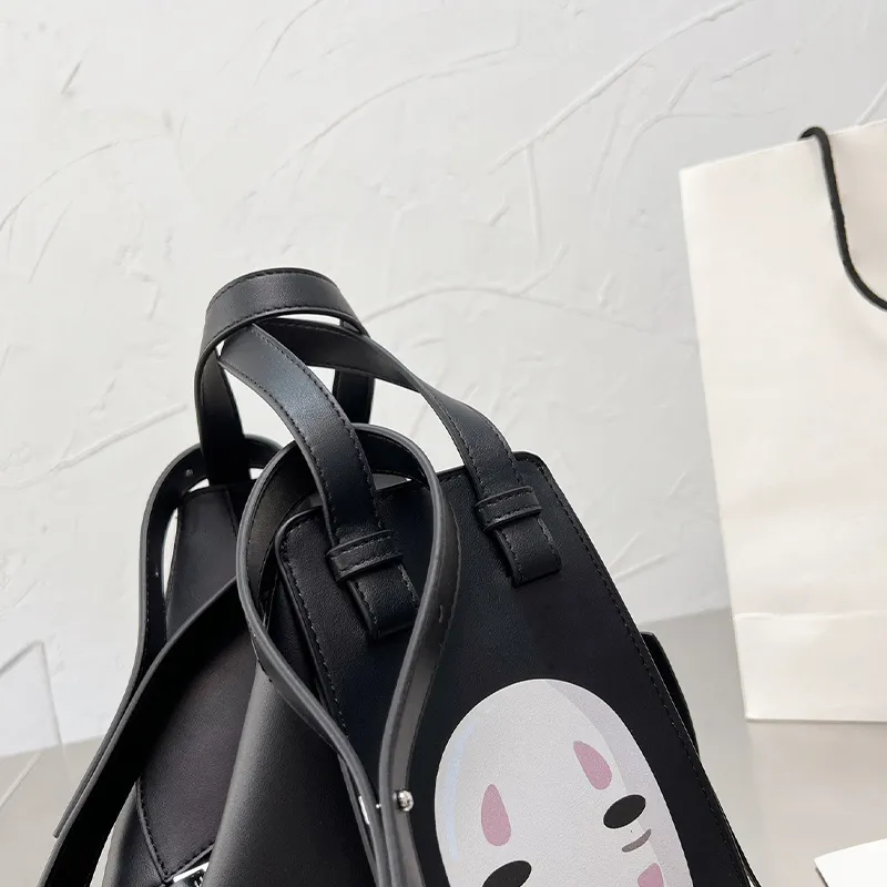 Designer kvinnor väska påsar handväskor kvinnliga ansiktslösa mäns stora kapacitet tecknad spirat bort ryggsäck singel axel väska165a