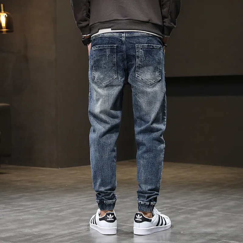 Dżinsy Mężczyźni zrelaksowani zwężane workowate spodnie haremu streetwear elastyczne talia Casual Joggers Pants Blue Męskie dżinsy spodnie CX220401