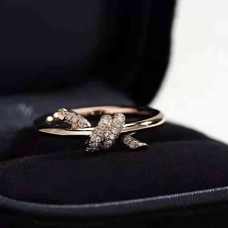 Nouveau anneau noueux femelle t sterling argent plaqué 18k gold ed corde ring style aa2204204722963