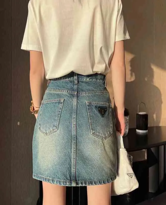Original novedad de verano casual versátil triángulo lavado jeans falda de cintura alta Falda corta Mujer