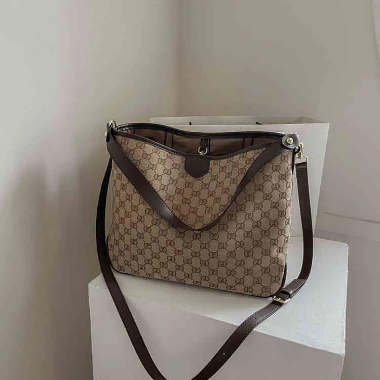 財布バッグ女性の高度な気分袋の新しい用途の空気キャンバスバッグシンプルワンショルダーハンドバッグ大容量