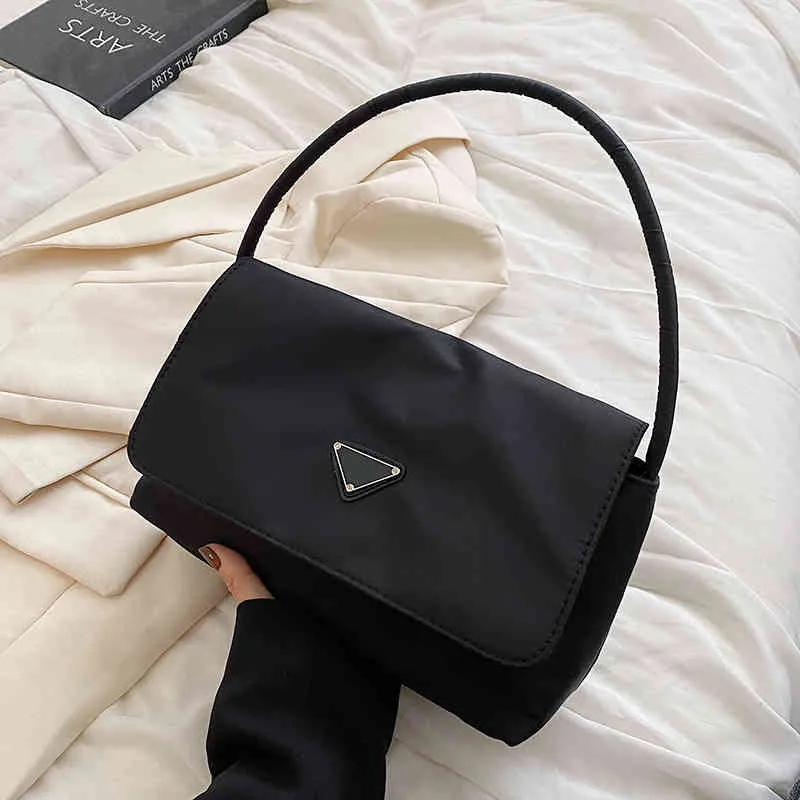 Черные маленькие сумки являются популярными женские 2022 летние летние универсальные Оксфорд, вращающиеся на одну плечо подмышечную сумку