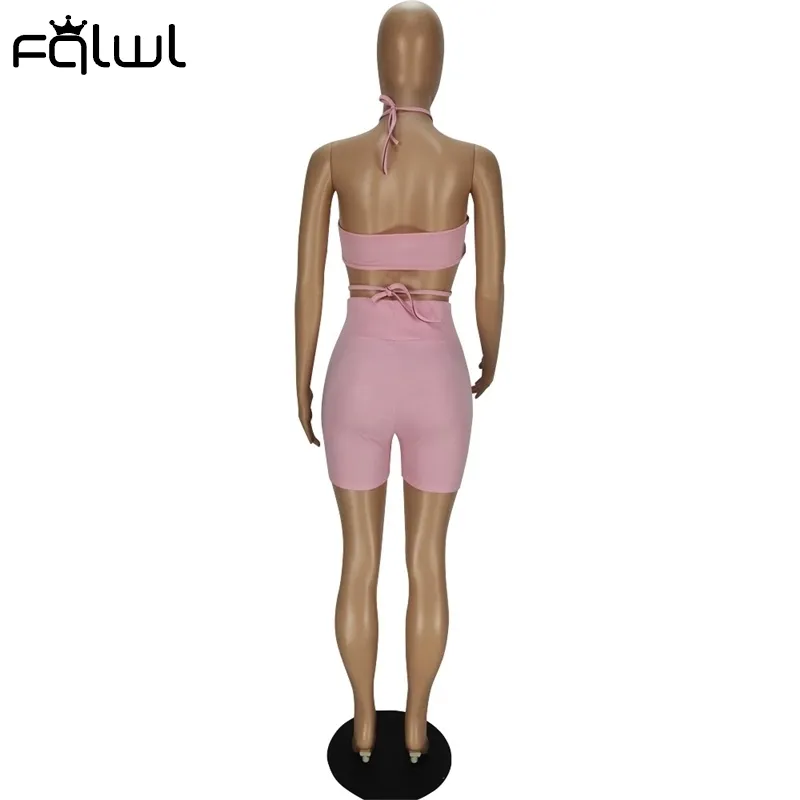 Fqlwl bodycon sommar streetwear 2 tvådelar uppsättningar kvinnor kläder backless halter skörd topp cyklist shorts set rosa casual tracksuit 220602