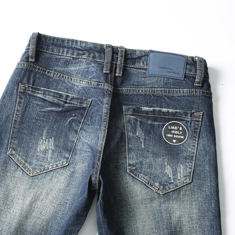 Masowe marki dżinsy proste wiosenne i jesienne Retro Blue Printed Pockets Dżinsy Mężczyźni Wysokiej jakości spodnie Ogółźwięczne 40 cx220401