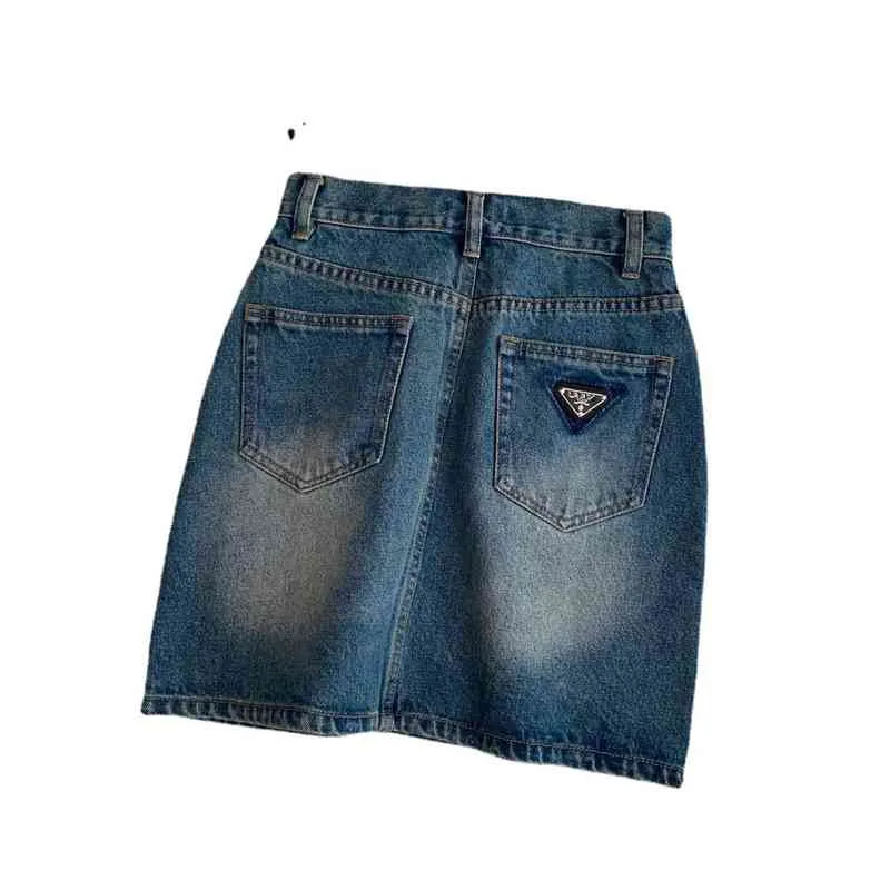 Original novedad de verano casual versátil triángulo lavado jeans falda de cintura alta Falda corta Mujer