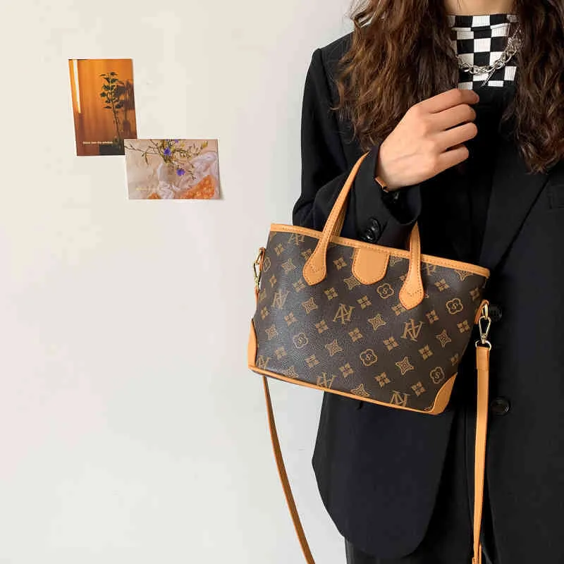 Borsa in vendita Borsa a tracolla di grande capacità da donna autunno e inverno nuovo fiore shopping portatile Tote Bag Fashion messenger pendolari