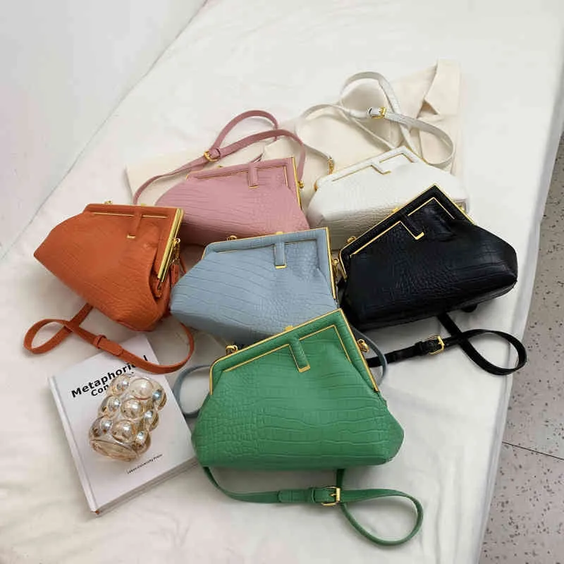 Borse 70% di sconto Borsa a tracolla a tracolla personalizzata alla moda da donna nuovo design di minoranza senso avanzato semplice coccodrillo messenger clip bocca Borse