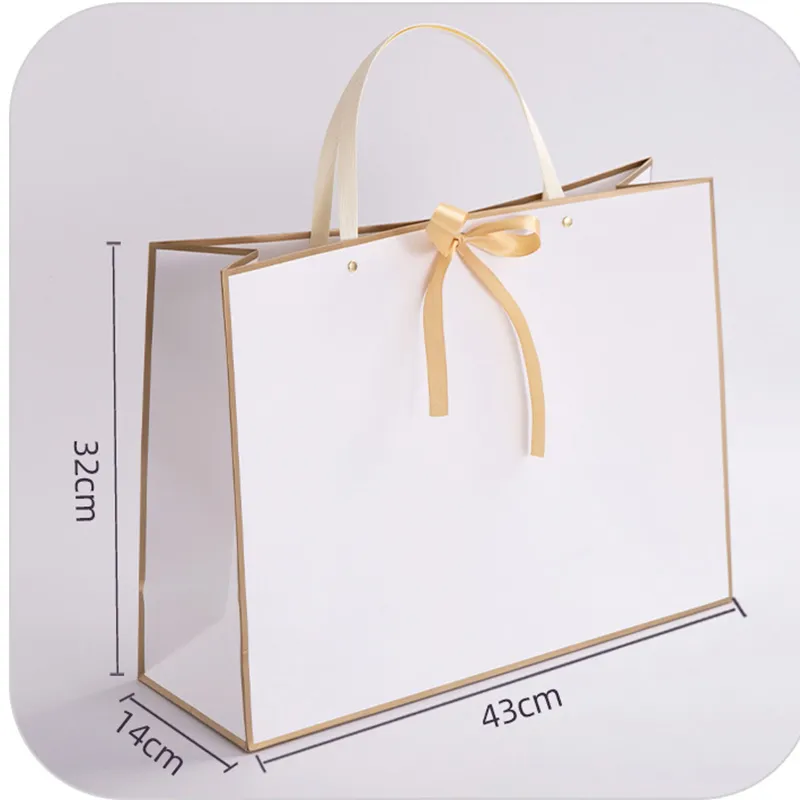 Free Custom HighQuality Rivet Paper Bow Tie Gifts Clothing With Handle Large Size Gold Ribbon Bag 220704