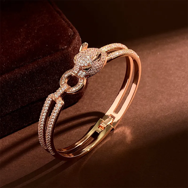 2022 Bransoletka kajdanek dla miłośników projektanta lamparta Bangle Luksusowa kryształowa biżuteria mody unisex podróży Breisure i wakacyjne bransoletki Złote ręce Banless Design