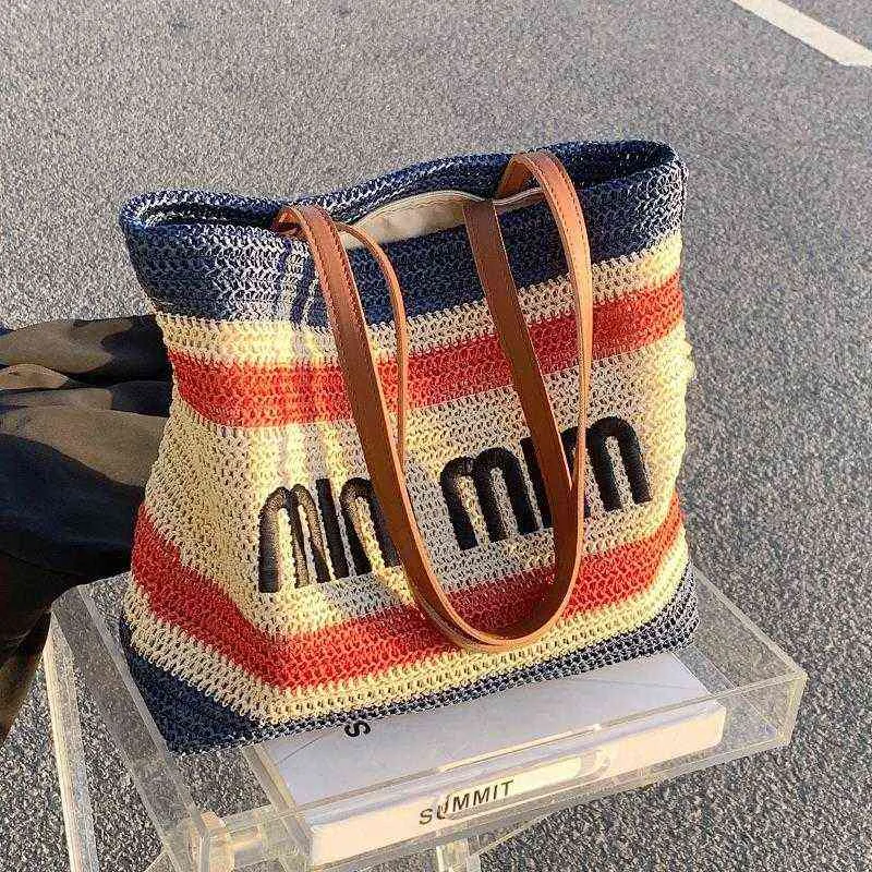 Bolsas Bolsa de palha de grande capacidade feminino 2022 Novo pano portátil para compras praia de praia