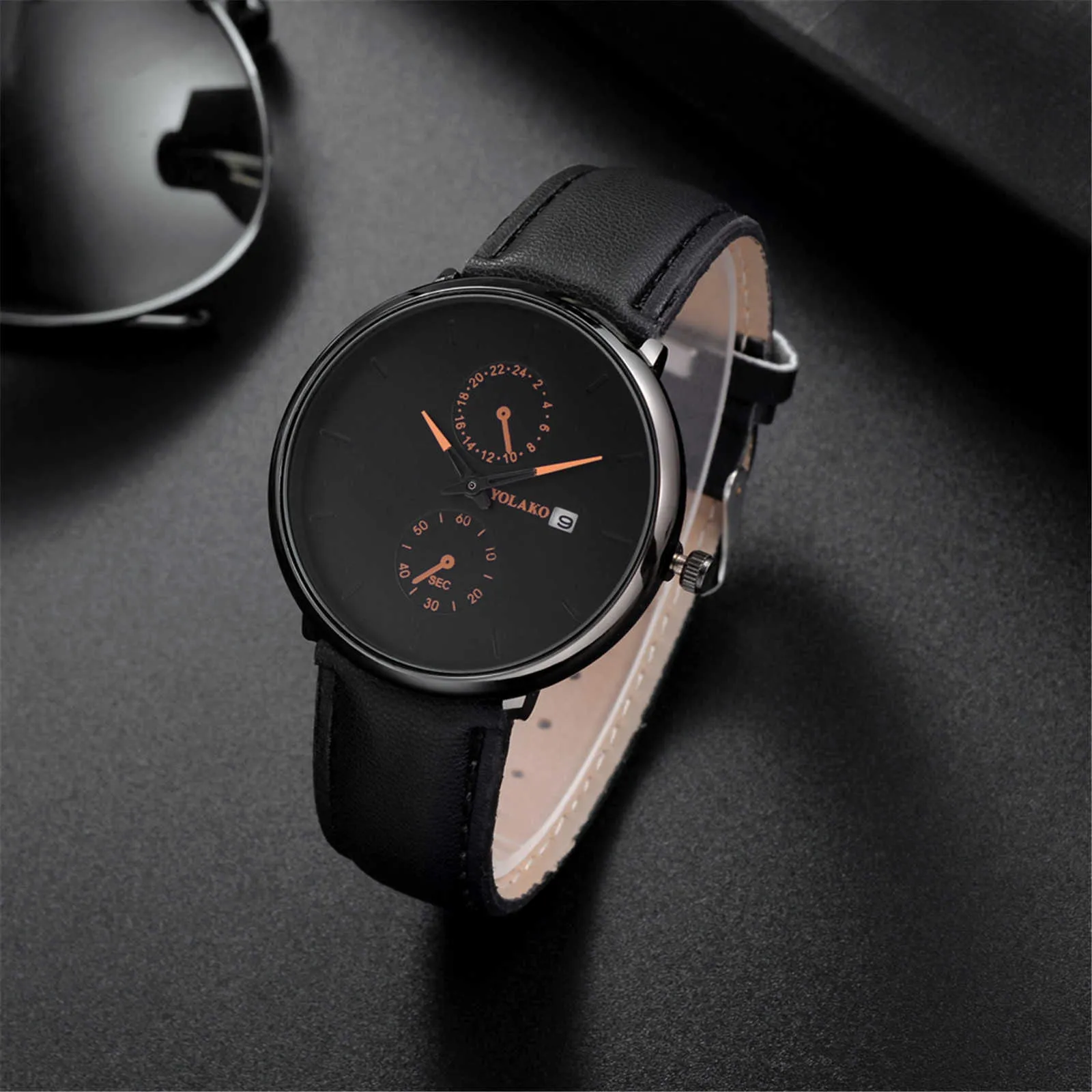 クォーツ時計シンプルなビジネスカレンダーダイヤルレザーストラップのためのファッショントレンドクリエイティブな腕時計ドロップ船