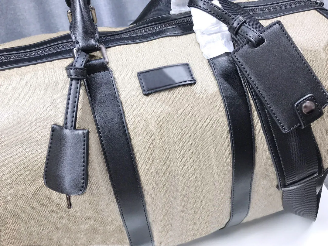 Top Quality handbag Large Capacity Duffle Bag lock Travel Bags Outdoor Soft Genuine Leather canvas Print Letter GM Designer Luggag315Z