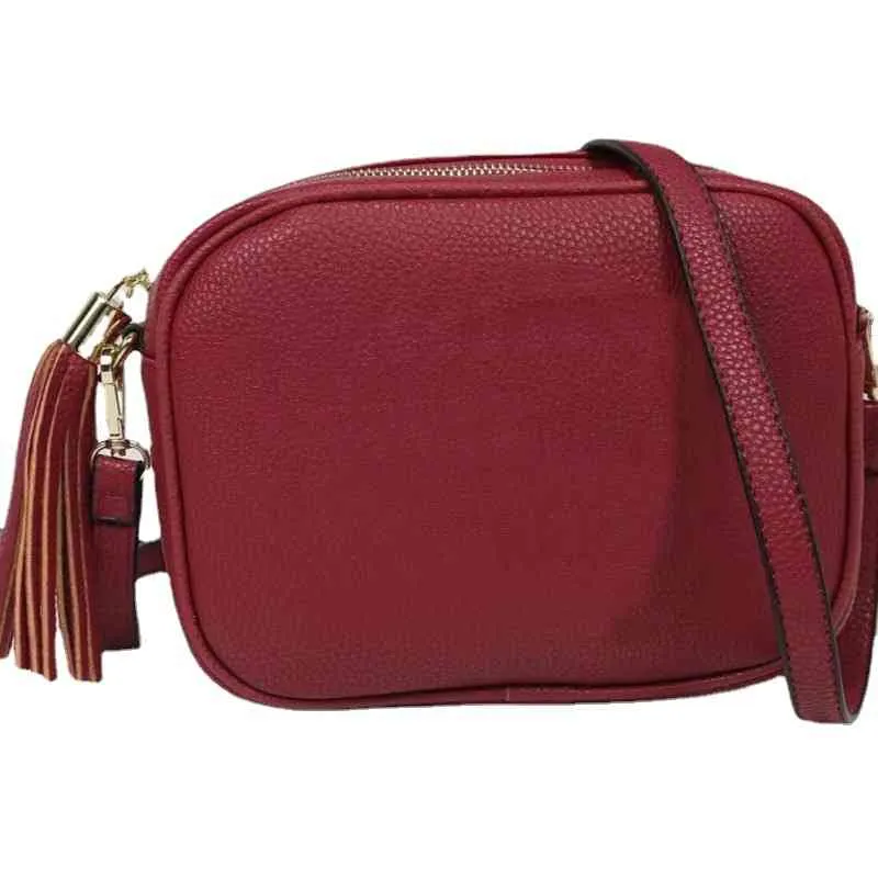 Handbags 70% Off Girl's small round bag litchi pattern messenger women's one shoulder tassel shopping purses