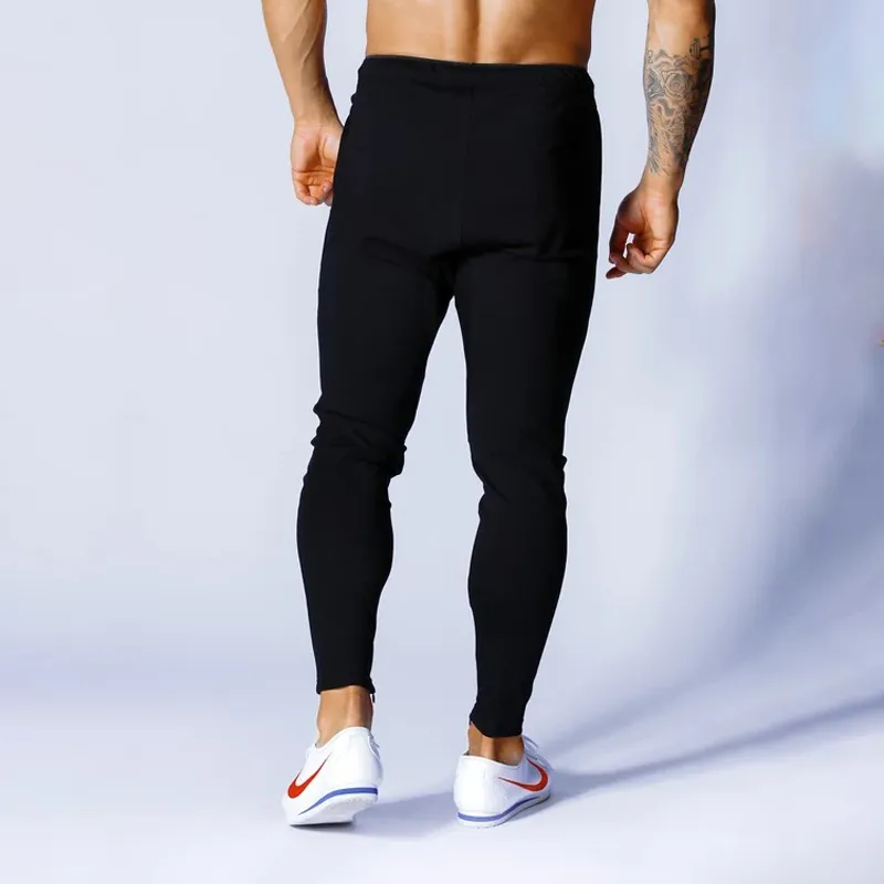 Homens calças de moletom fitness fisicultura de calças de calças casuais homens jogadores calças calças de moletom de algodão slim fit
