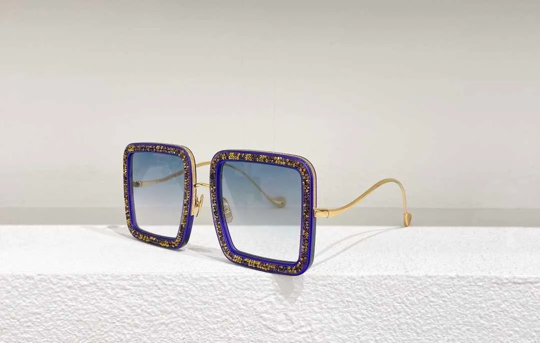 Europäische und amerikanische Mode Big Frame Broken Diamond Sonnenbrille Schwedischer Designer großer Name All-Match-Frauen-Farbbrille