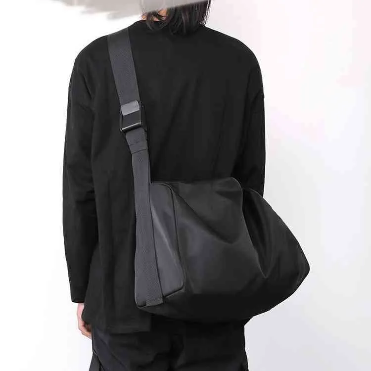 Bolsas de bolsas de trabalho masculino Mensageiro da bolsa cruzada Função College Student Postman Leisure One ombro Backpack Feminino bolsa feminina
