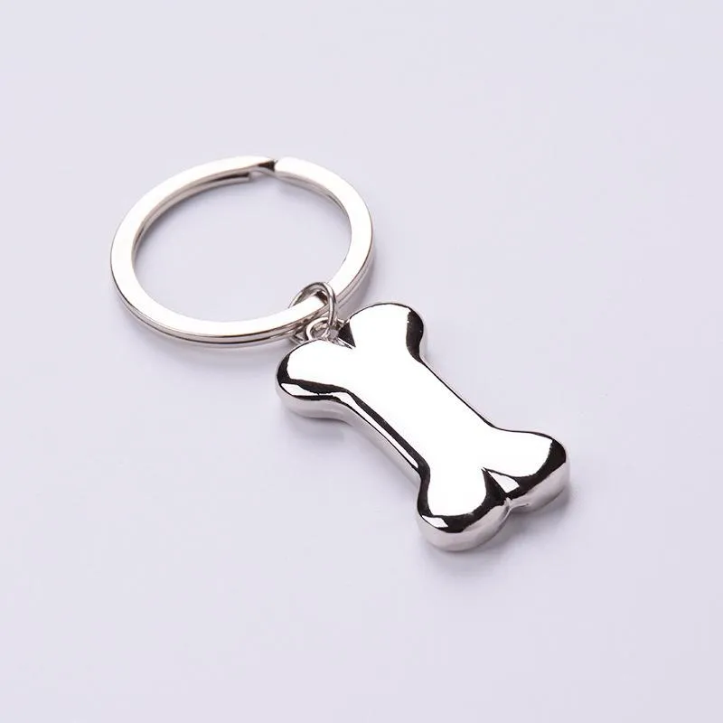 Anahtarlık sevimli köpek kemik anahtar zinciri moda alaşımları evcil hayvan sarkan etiketler erkekler için yüzük kadınlar hediye araba anahtar zinciri jewelrykeychains2435
