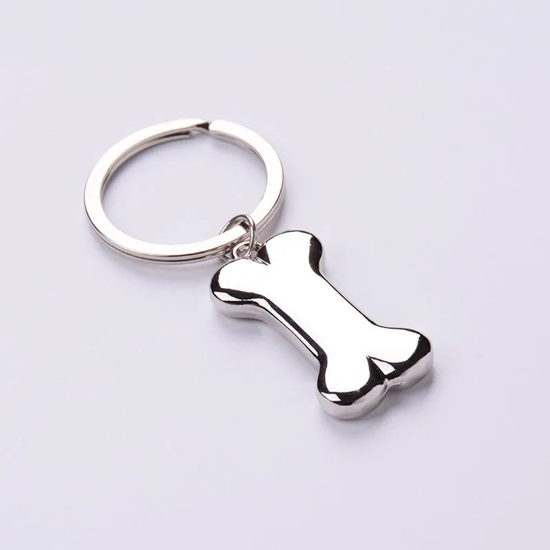 Schlüsselanhänger Netter Hundeknochen Schlüsselanhänger Mode Legierung Charms Haustier Pendent Tags Ring für Männer Frauen Geschenk Auto Schlüsselbund SchmuckKeychains228B