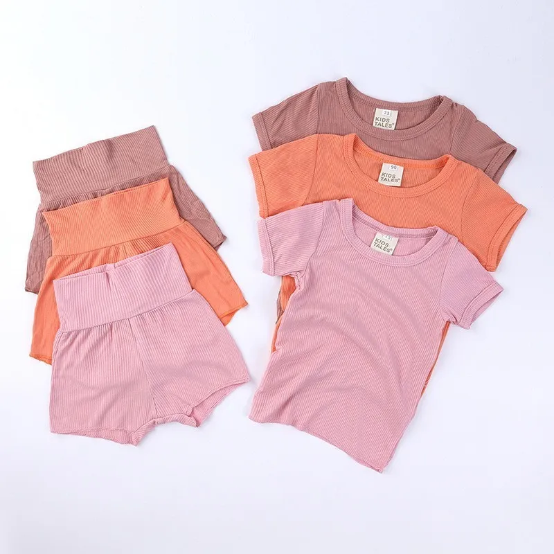 Zomer geboren babymeisjes jongens kleren sets geribbelde katoenen korte mouw t -shirt shorts peuter baby high taille outfit set 220620