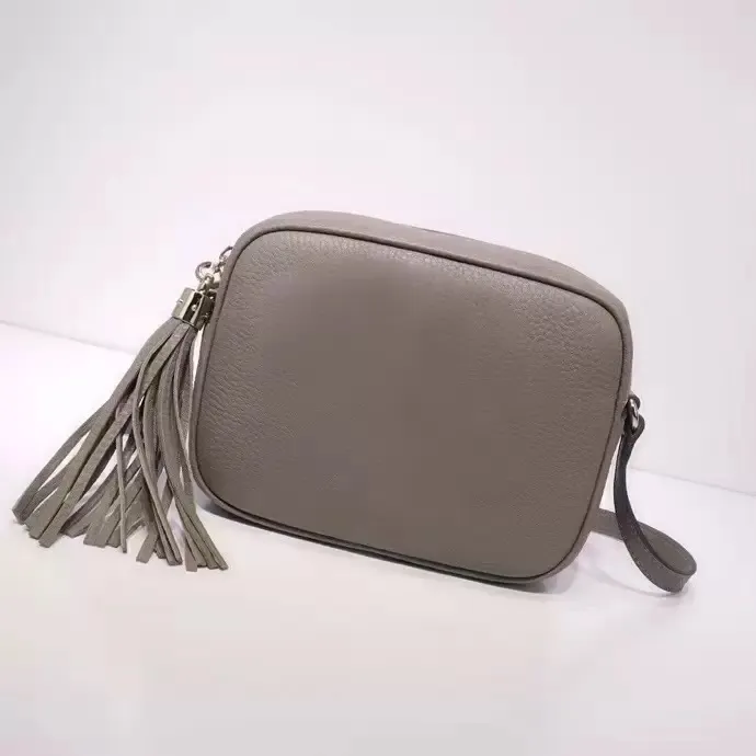 Soho Małe skórzane worki dyskotekowe designerka kamera torby na ramię oryginalne skórzane kobiety messenger crossbody frędzle torebki siodle EM289B