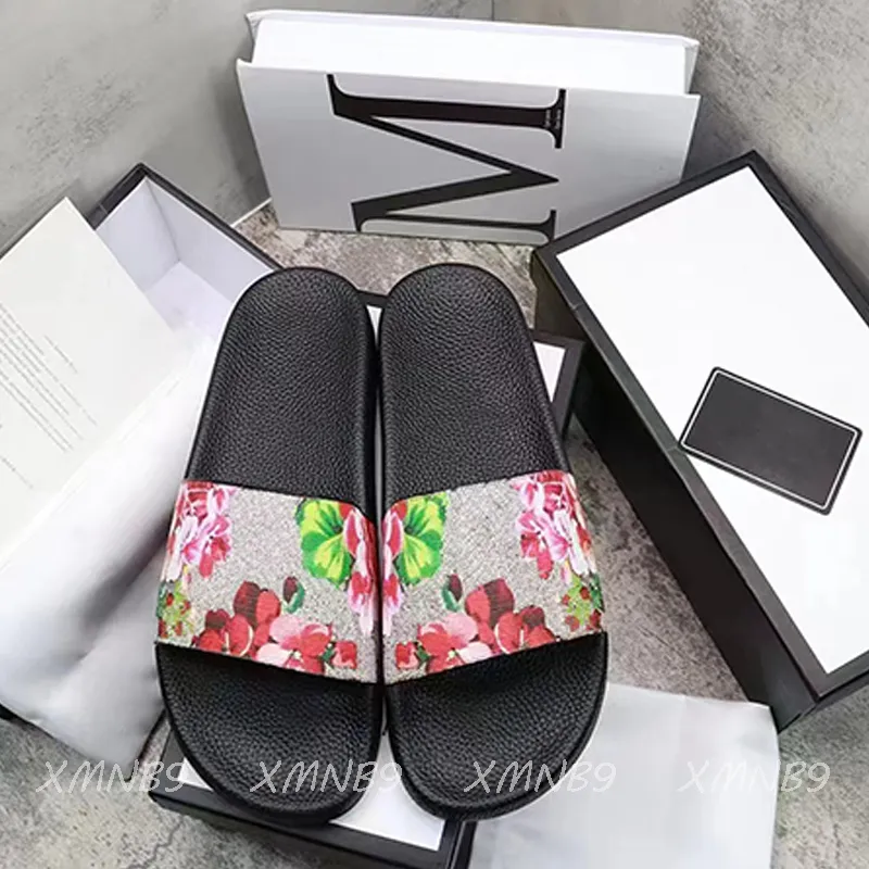 Herrendesigner -Hausschuhe Mode 2022 Neue Frauenrutschen Sandalen Unisex Luxus Schuhe Sommer Beach Folien Flachplattform Blumen Damen Sneaker