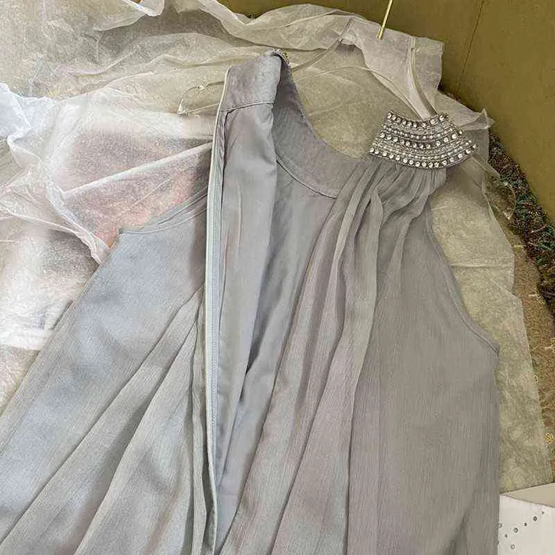 Sweet Halter Dress French Holiday Style Texture Chiffon Heavy Industry Pärlor med rund nackdocka kjol sommar ny