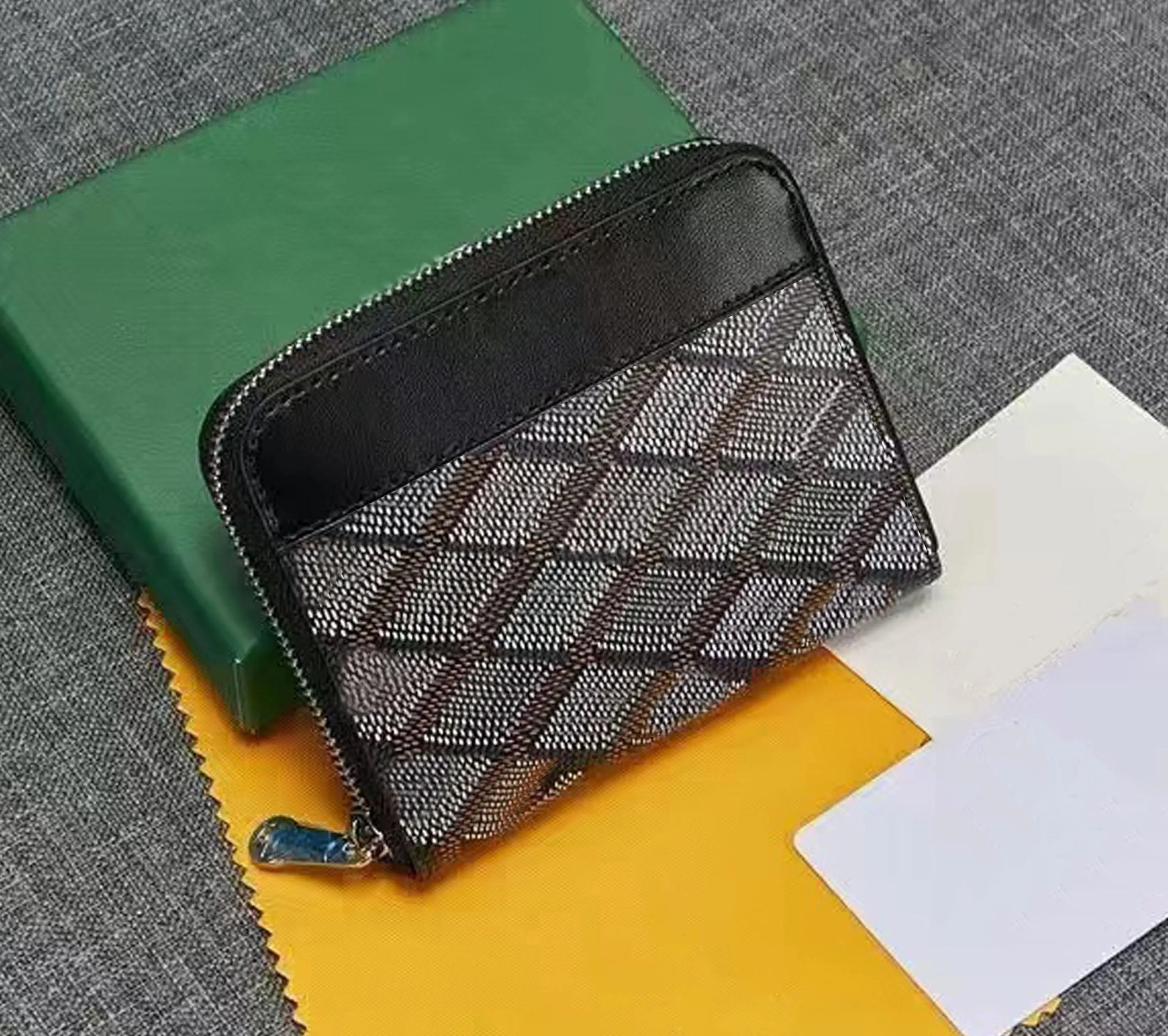 Luxusdesigner -Marke Münze Geldbörsen Männer und Frauen Goyan hochwertige Halbverdächer Cowide höchste Designer Taschen Weihnachten gefaltet in Half Card Wallets Factory Direktverkauf