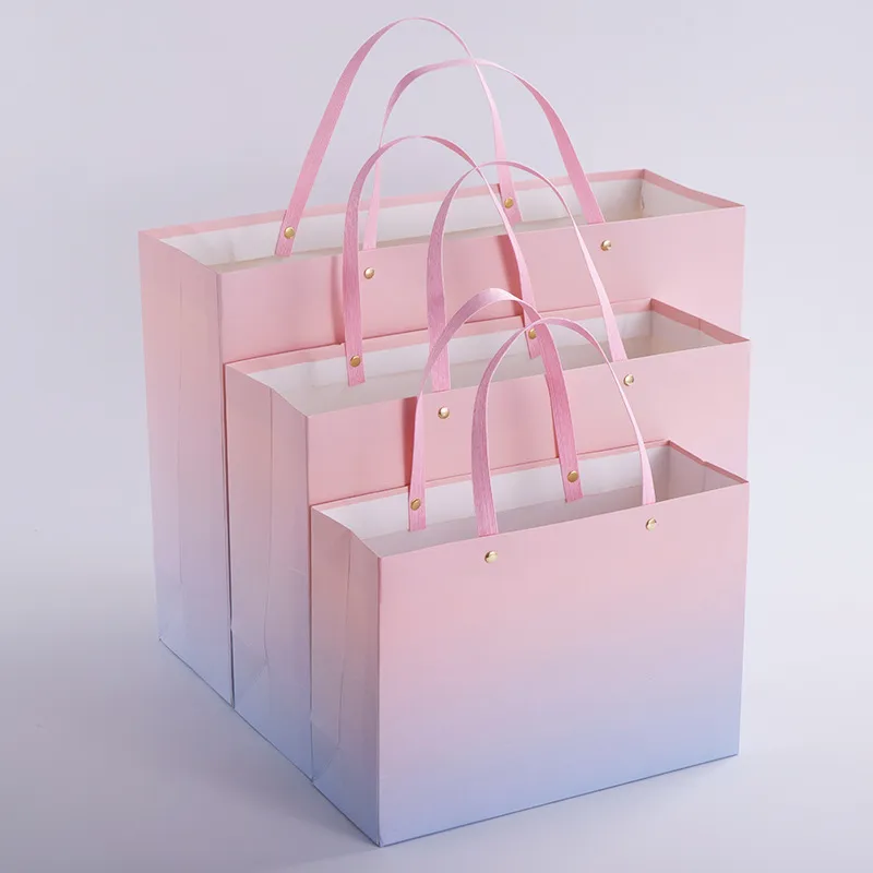 Free Custom HighQuality Rivet Paper Gifts Clothing With Handle Large Size Packing Storage Bag 220704