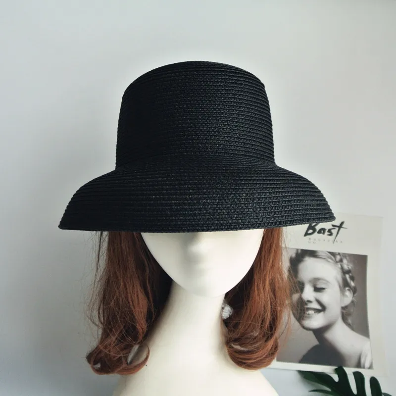 Cappello parasole vintage da donna in puro colore stile Hepburn le vacanze 5658CM Temperamento elegante moda estiva cappello di paglia di alta qualità 2205285Q