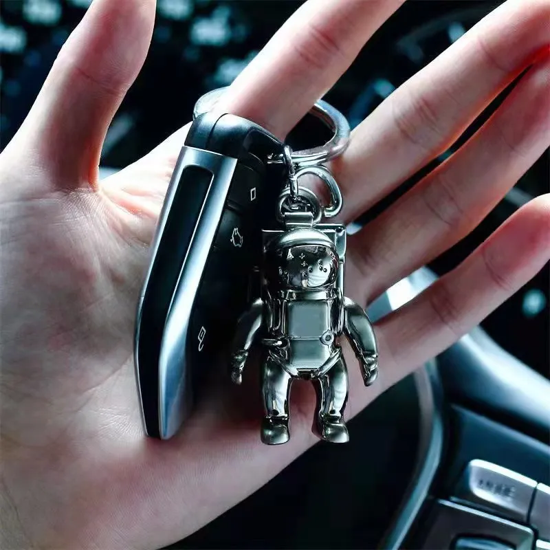 Ashion Nieuwe roestvrijstalen Spaceman Key Ring Luxe ontwerper Keychain Self Defense Hoogwaardige munt Purs Keychain Pendant Access267m