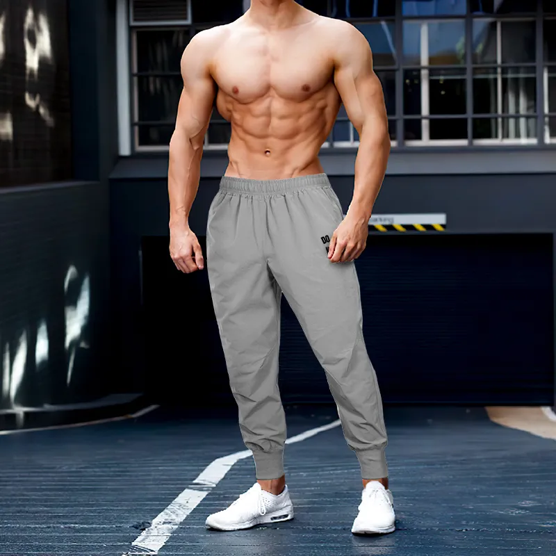Joggers Pants Men Muscle Fitness Running Pants Training Sport Quick Dry Gym Training Sweatpants Bodybuilding Beam Mouth Trouser 220621