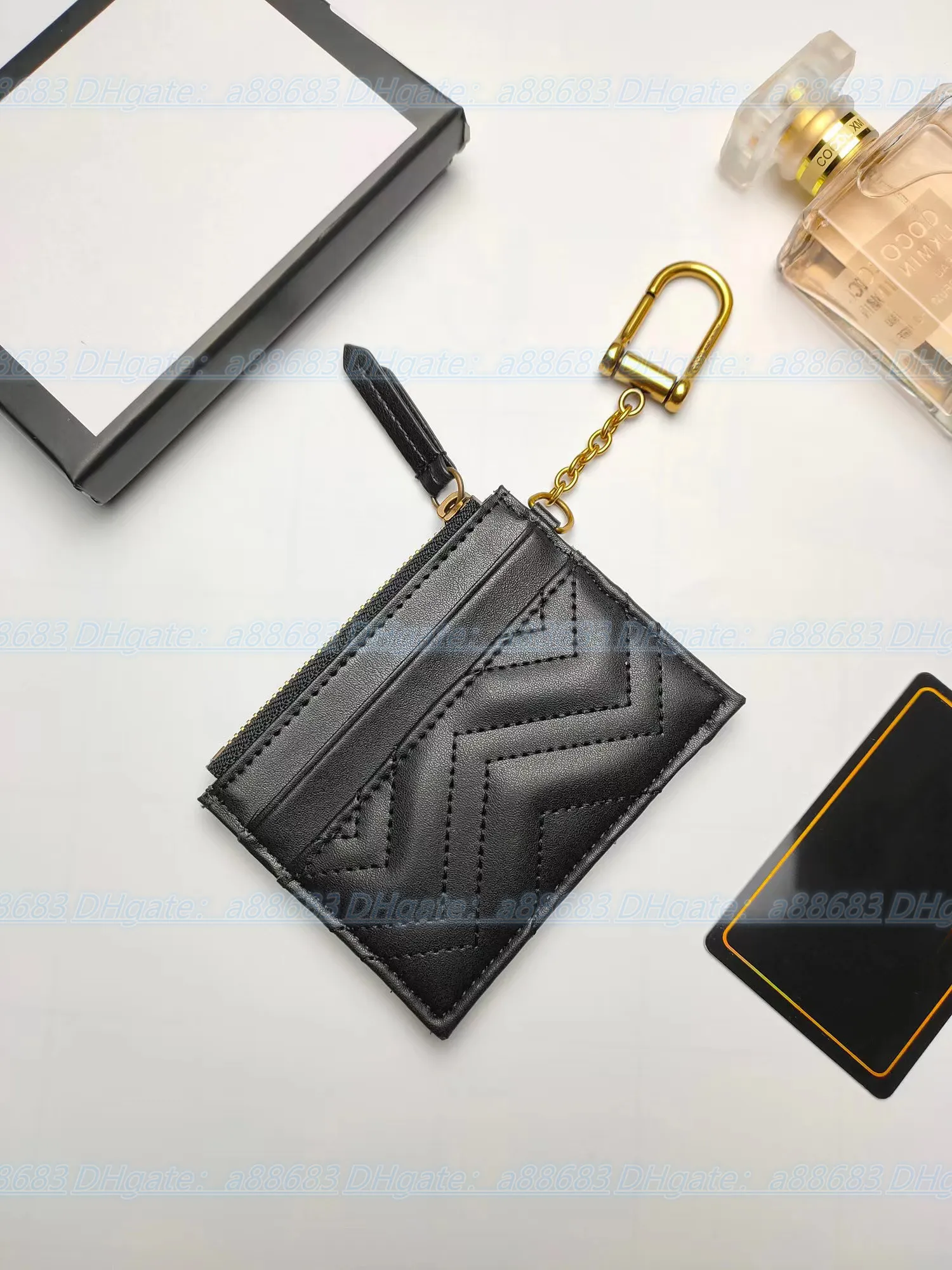 Luxurys Designer Kartenhalter Geldbörse Schlüssel berühmter Beutel Marmont Reißverschluss Brieftaschen Modekarten Hangbag Münzen Echte Männer Brieftasche Leder325q