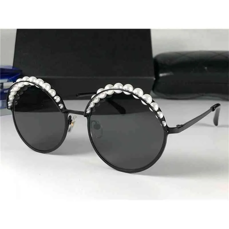 High quality fashionable sunglasses 10% OFF Luxury Designer New Men's and Women's Sunglasses 20% Off Fashion Version Hot pearl round same