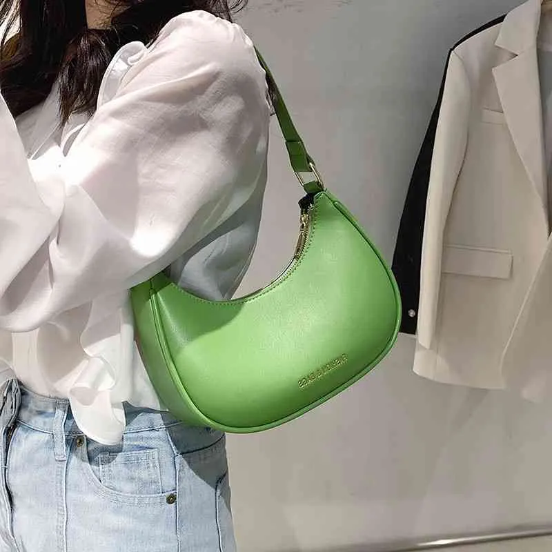 Ny mångsidig en axel armpit väska Messenger Bag mjukt läder dumpling väska mobiltelefon