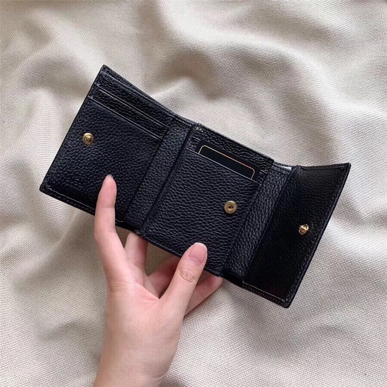 Delikat män Kvinnor Money Clips Top Layer Läder Fällbara plånböcker Korthållare Mynt Purse unisex mini plånbok med Box284s