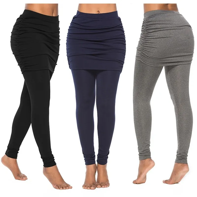 Designer falska två stycken leggings slim penna byxor kvinnor leggings pantalon pack hip pläted kjol damer solid färg väska hip sid