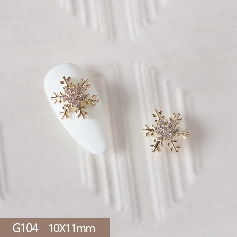 10 sztuk / partia G104 Stop 3D Christmas Snowflak Nail Art Cyrkon Metal Manicure Nails Akcesoria DIY Dekoracje do paznokci Dekoracje Materiały Charms