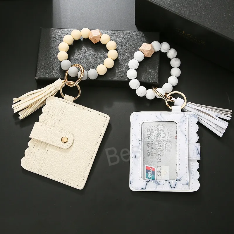 Portefeuille de téléphone portable en cuir pour femmes avec bracelet à pompon Cartes de nom Sacs de rangement de crédit Sac de porte-clés en perles de silicone BH6284 TYJ