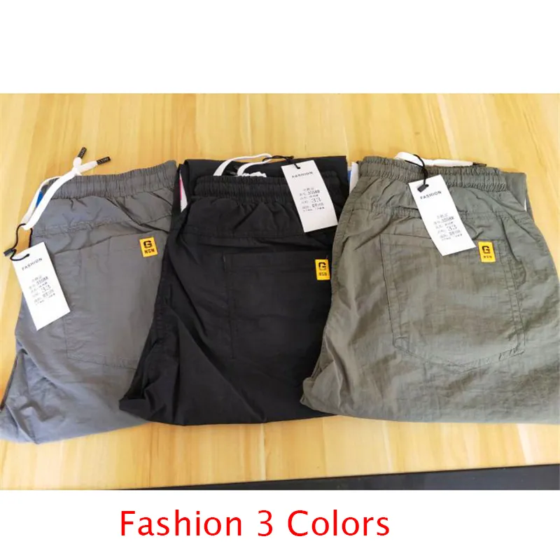Summer Men Pants Sports Outdoor Casualne spodnie Solidny kolor elastyczny talia lekka wygodna długie spodnie Plus Size 220714