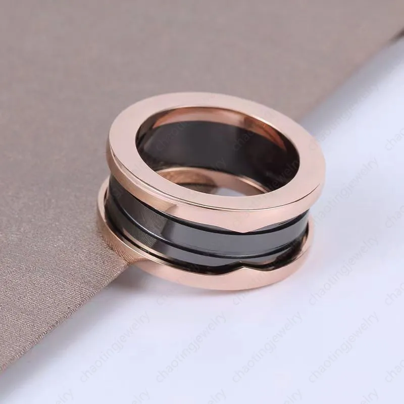 B NOWOŚĆ PIERŚCIENIA DOBRA ZESPEŁEM TYTANIUM STAL PIERŚCIENI Mężczyźni i kobiety Para Rose Gold Silver Ring Pierścień świąteczny Rozmiar 5-12 Szerokość 10 mm244n