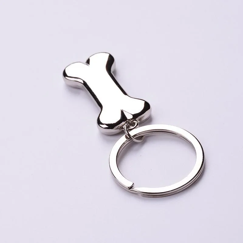 Kleryki Śliczne kość piesowa łańcuch kluczowy stopę mody uroków zwierzaka wiszące tagi pierścień dla mężczyzn kobiety prezent samochodowy biżuteria