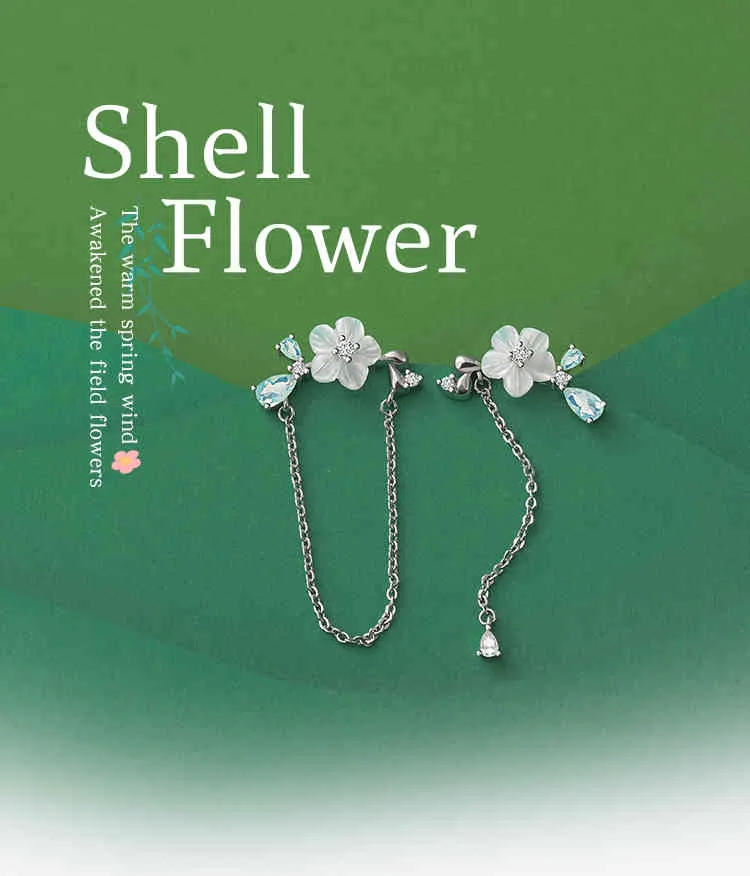 THAYA Silver Color Studs Chain Shell Flower Dangle de alta calidad para mujeres Estado de la temporada de aretes Joyas finas