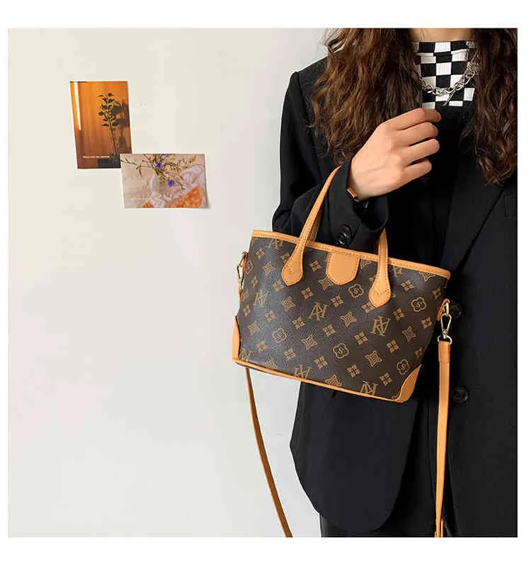 Borsa in vendita Borsa a tracolla di grande capacità da donna autunno e inverno nuovo fiore shopping portatile Tote Bag Fashion messenger pendolari