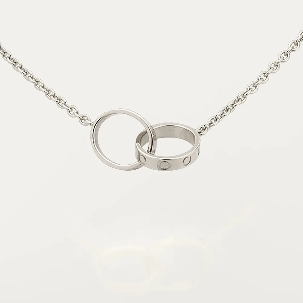 Alta edição design clássico pingente amor colar para mulheres meninas duplo laço encantos 316l titânio aço jóias de casamento colares 2628