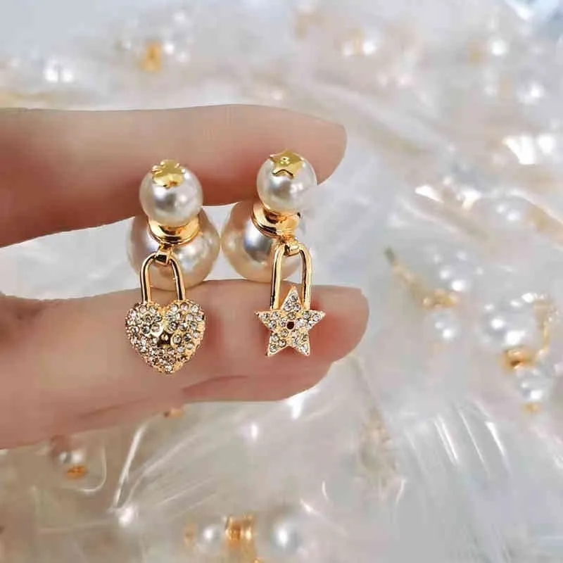 Estrellas de amor outlet llenas de pendientes asimétricos de perlas de diamante pendientes de oro claro para mujeres