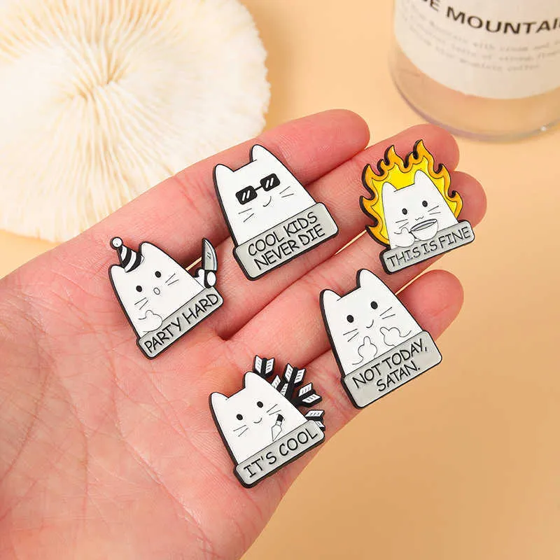 Cute white cat gets hit by an arrow, plays handsome brooch with a knife, clothing accessories, metal badges and funny buttons