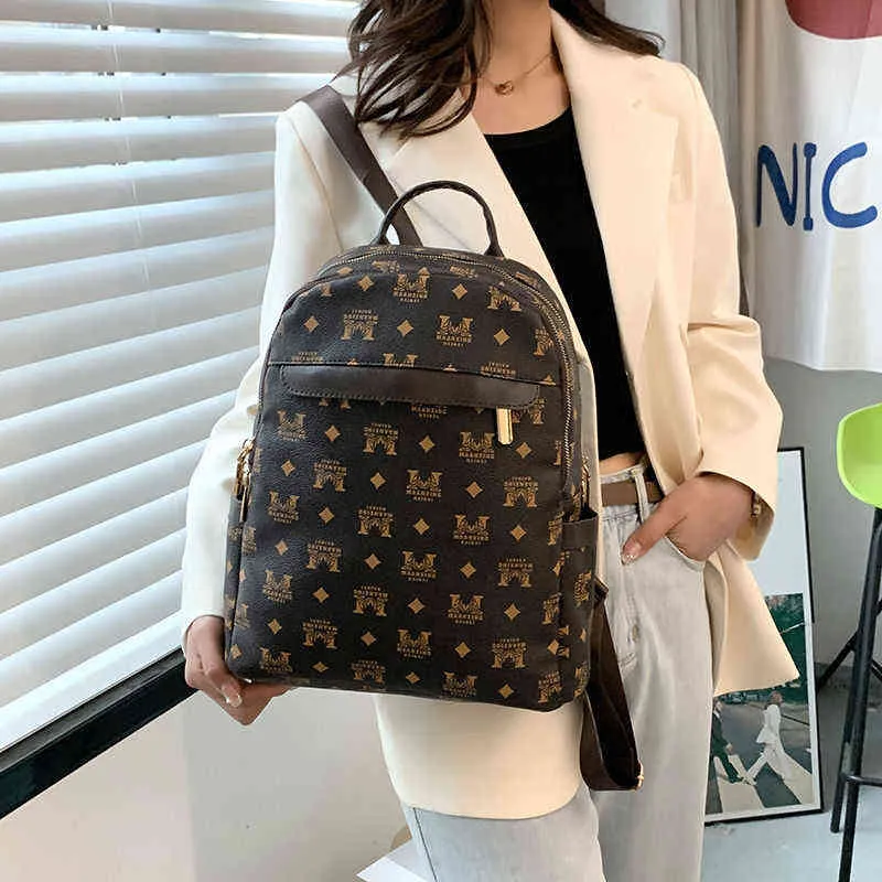 Premium printed backpack women's 2022 new leisure large capacity Travel Backpack versatile soft leather schoolbag223M