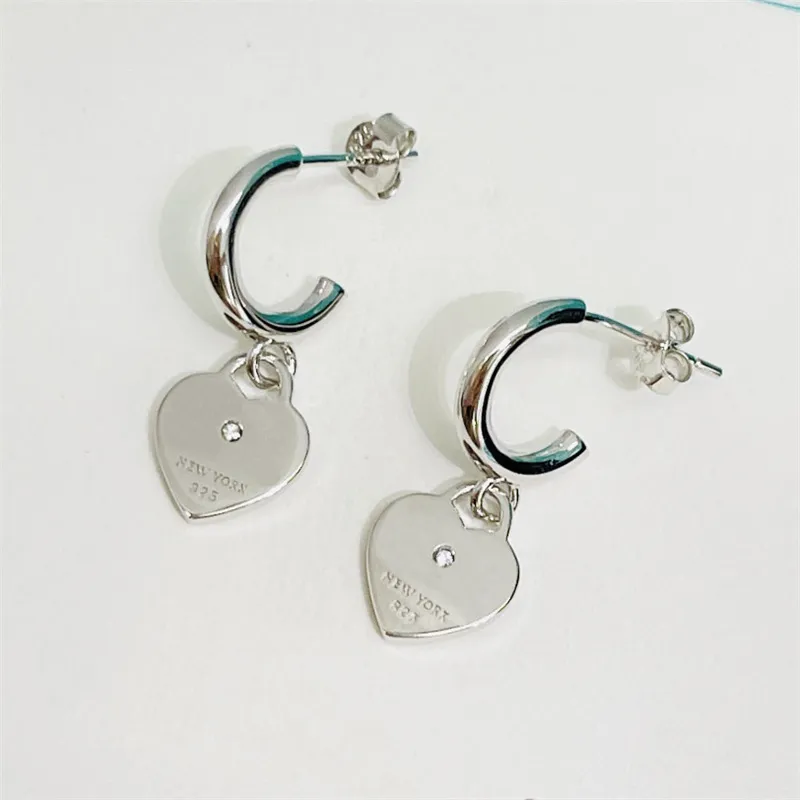 Pendientes de diseñador para mujer para damas Diseñadores Pendientes de corazón Plata Moda Joyería de lujo Pendientes de diamantes Amantes Stud Ear Rings223p