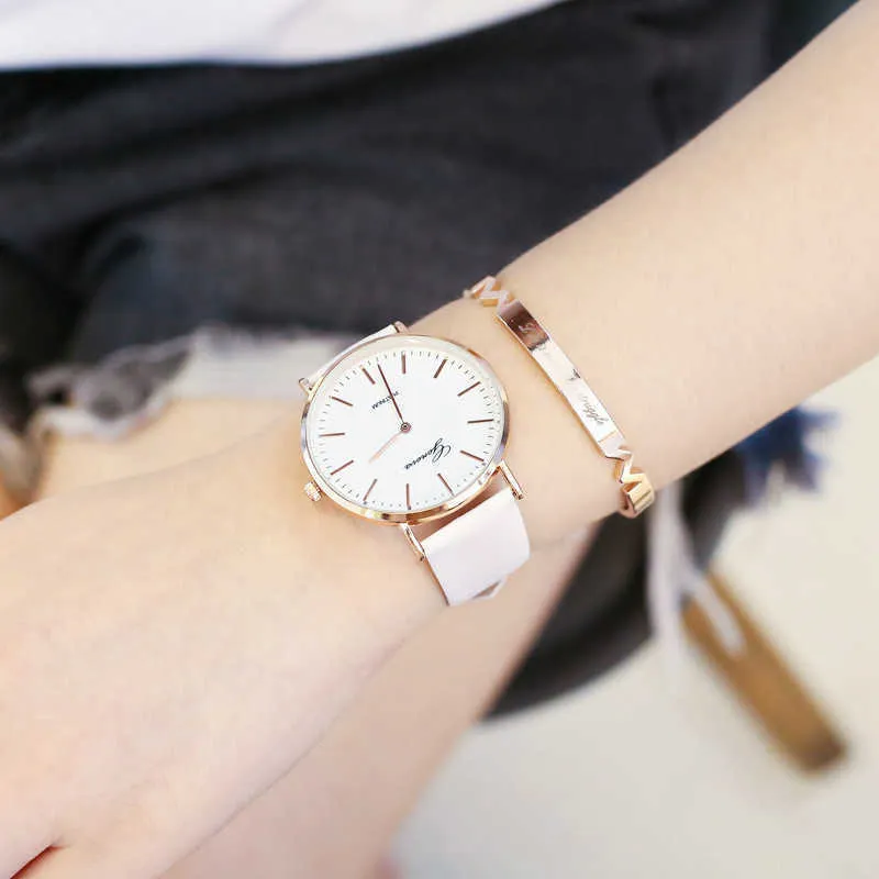 Mode vrouwen horloges thermochromische dameshorloge eenvoudige schaal quartz vrouwelijke klok